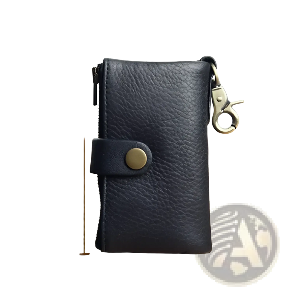 Black leather key chain wallet for men with textured surface brass-toned metal clasp and button closure