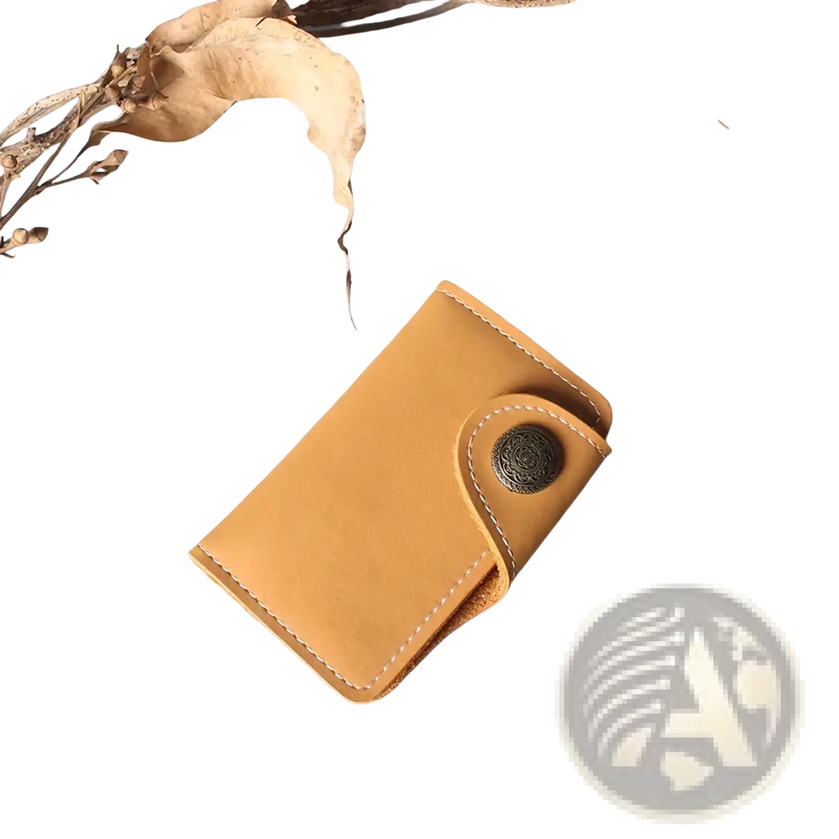Leather key pouch wallet with card holder in tan leather with white stitching and dark ornate metal button closure