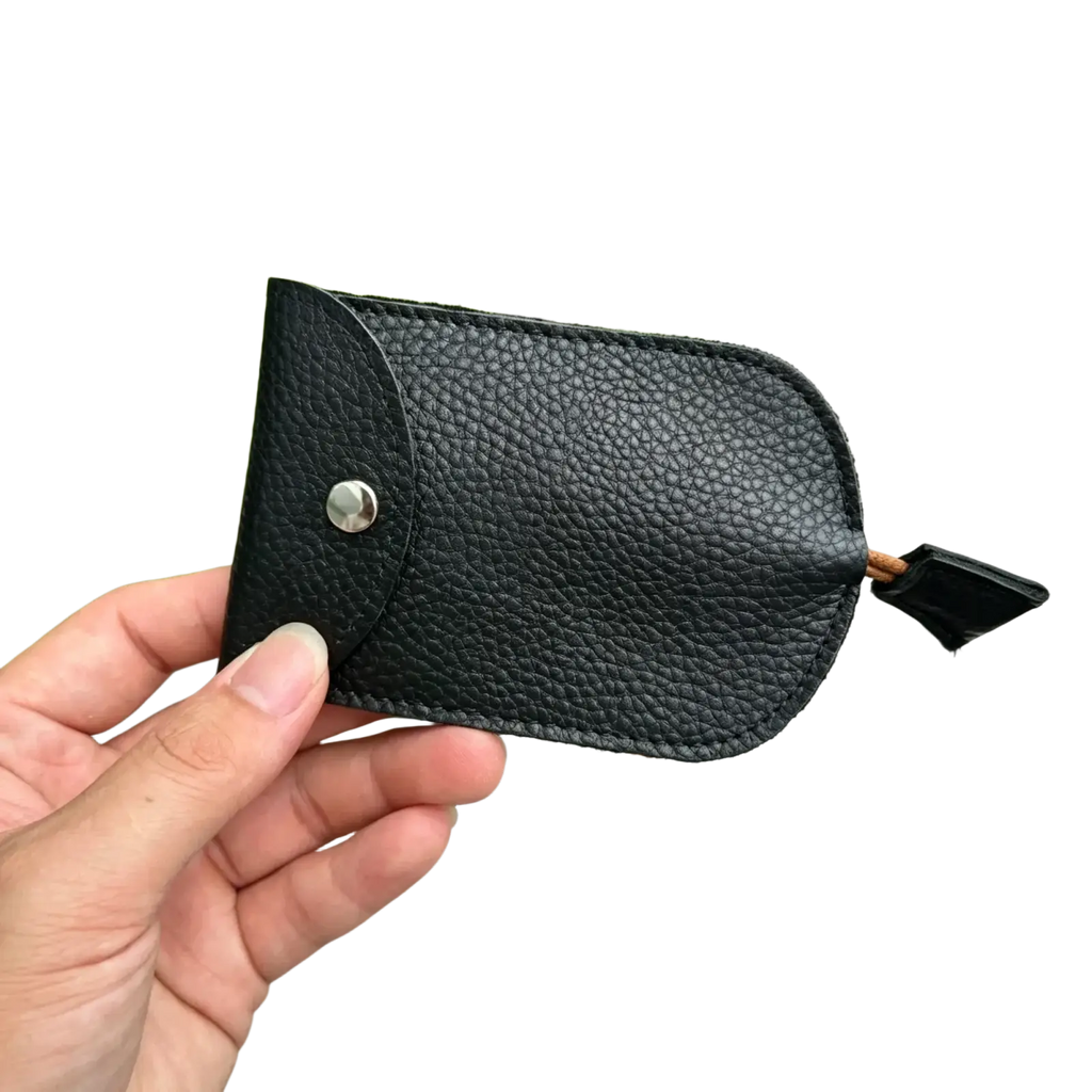 Black pebbled leather key wallet case pocket holder with silver snap button and small black fabric loop