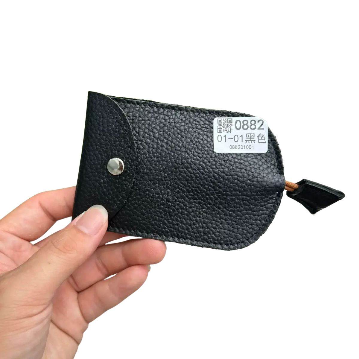 Black textured leather key wallet case pocket holder with silver snap button and small black fabric loop at the end
