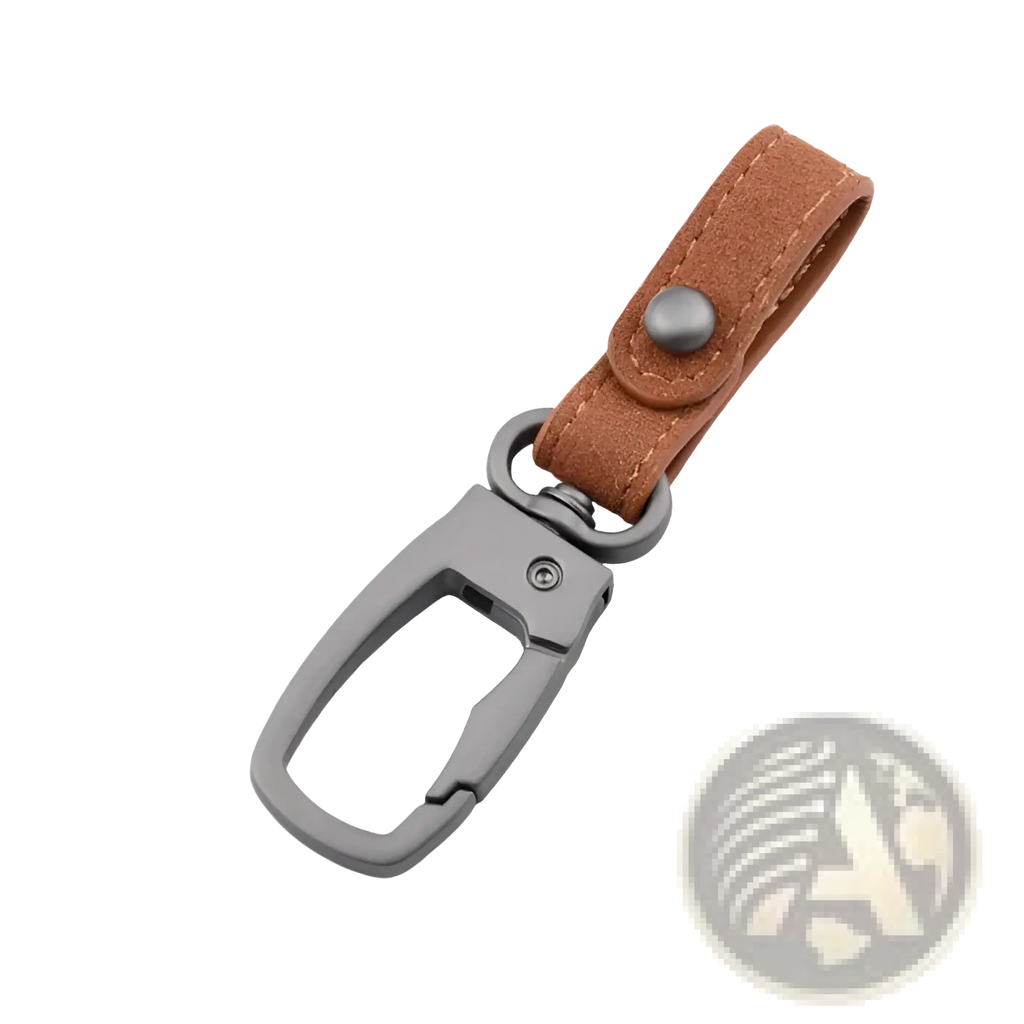 A sleek matte gray metal carabiner keychain with tan suede leather strap and silver button closure for organizing keys