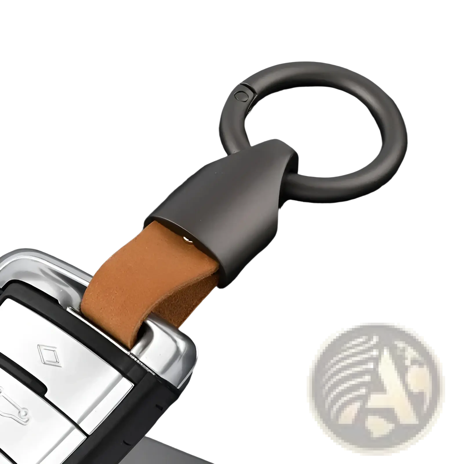 Dark gray metal leather keychain with tan leather strap attached to a car key fob for bag charm use