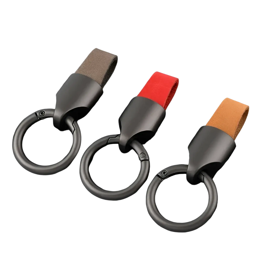 Leather keychain carabiner ring bag charm with matte black metal rings and suede straps in tan red and orange