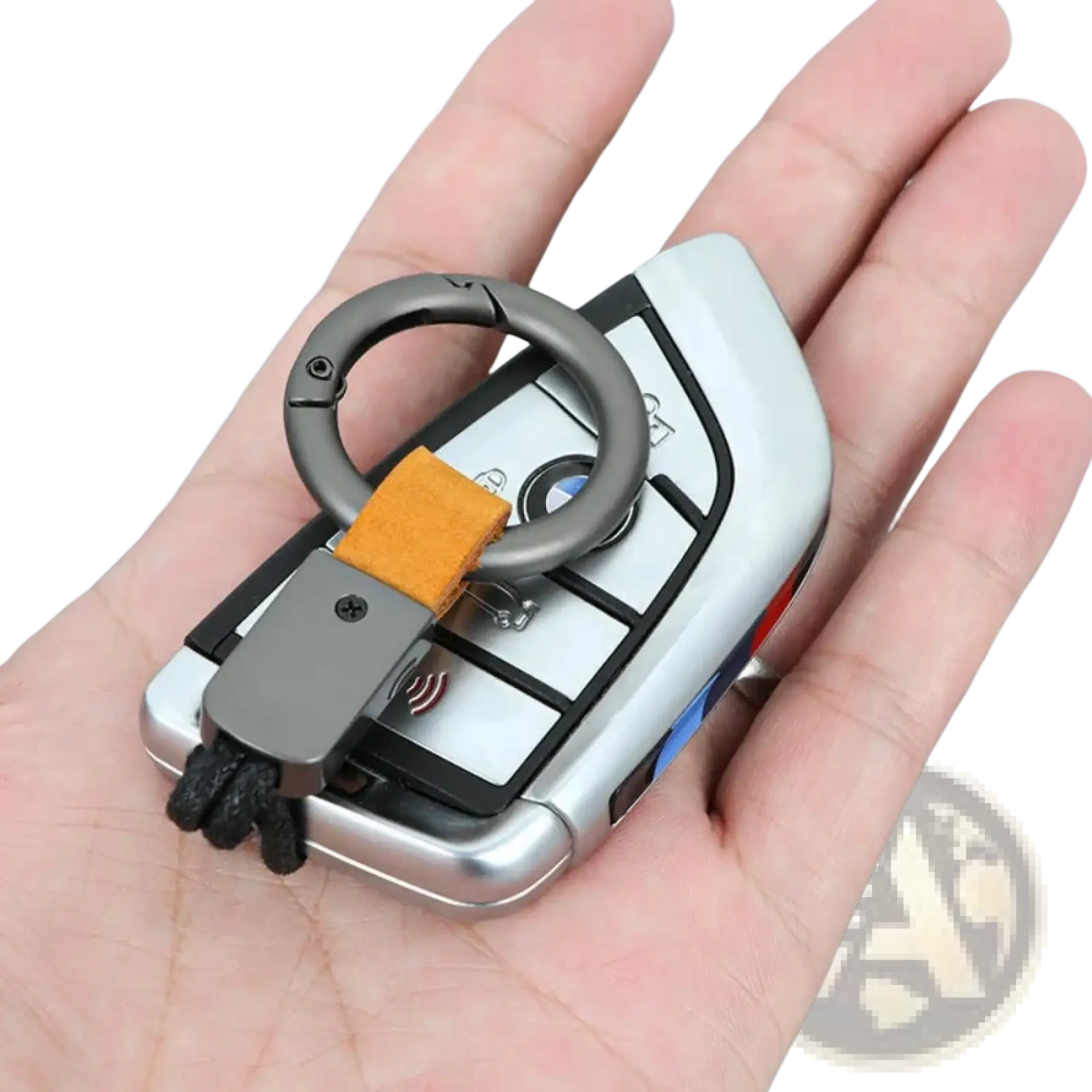 Silver bmw key fob attached to a leather keychain lanyard with a matte black metal ring carabiner and orange strap