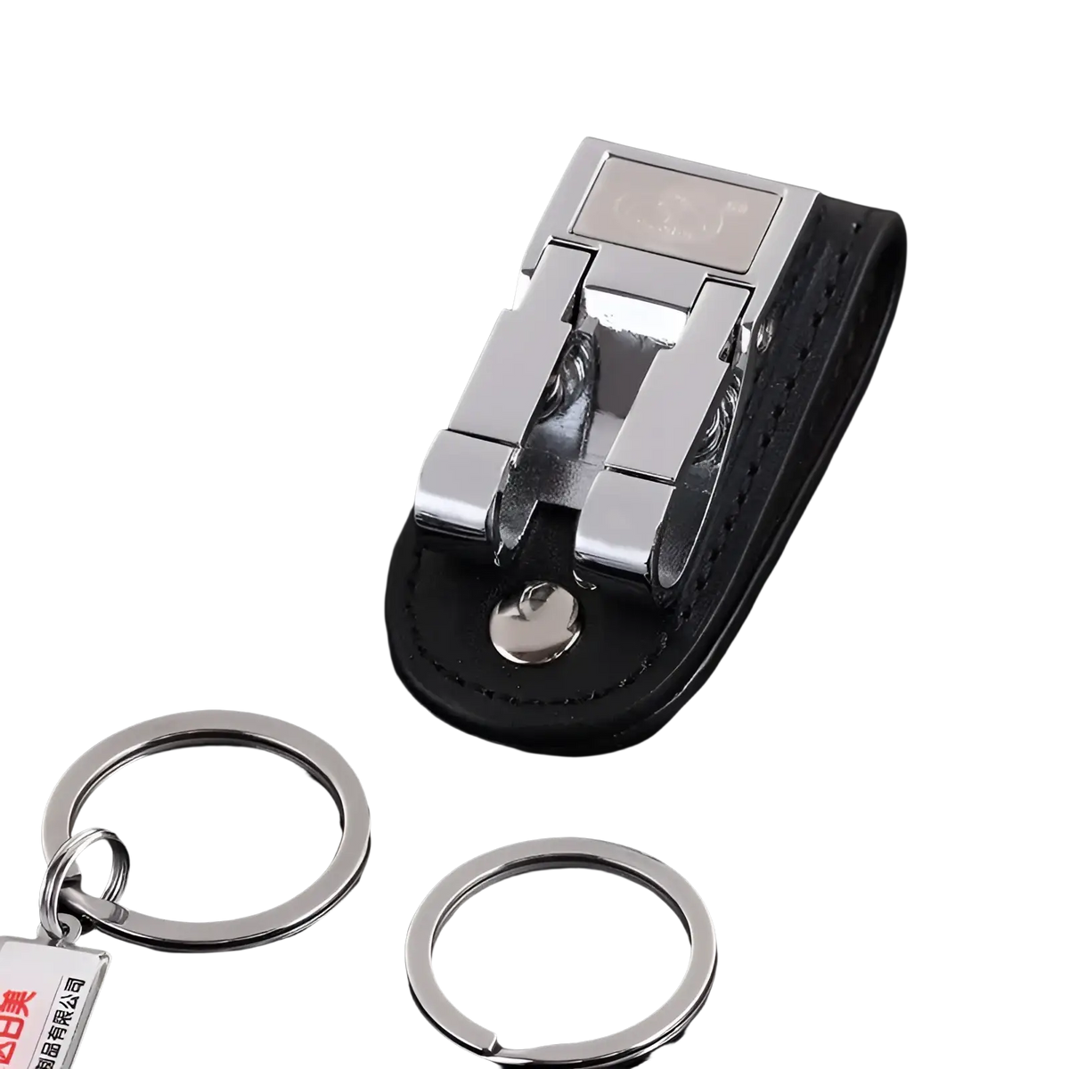 Black leather keychain with a silver metal clip ring holder for secure attachment and everyday use