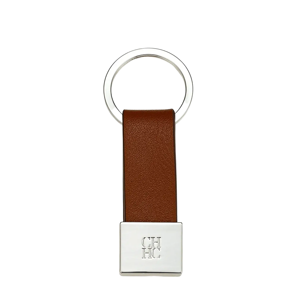 Brown leather keychain with silver metal ring and engraved square plate for minimalist luggage accessory