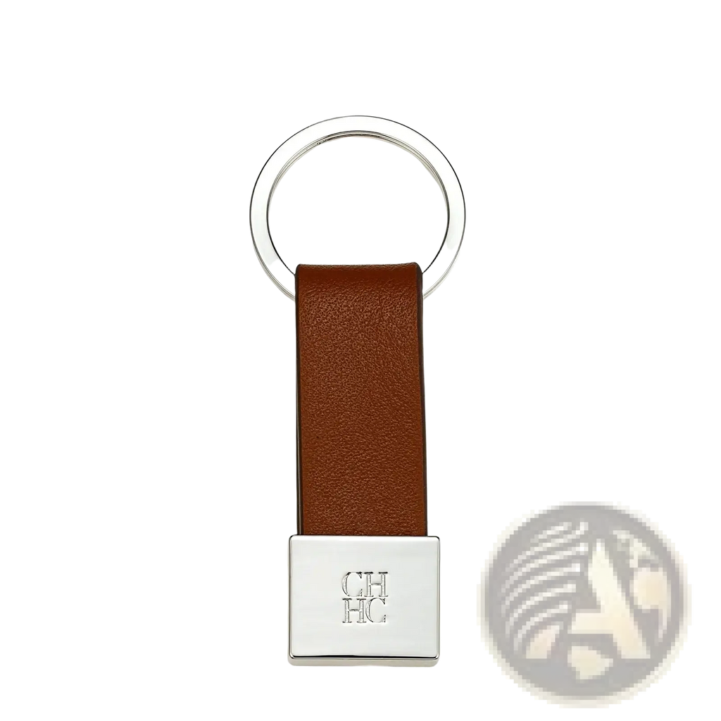 Brown leather keychain with silver metal ring and engraved square plate for minimalist luggage accessory