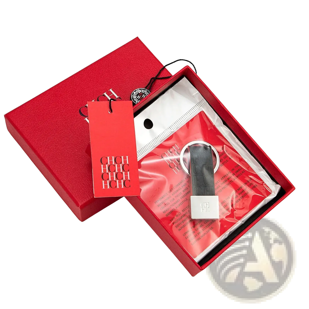 A sleek black and silver leather keychain with minimalist design featuring the h for luggage accessory use