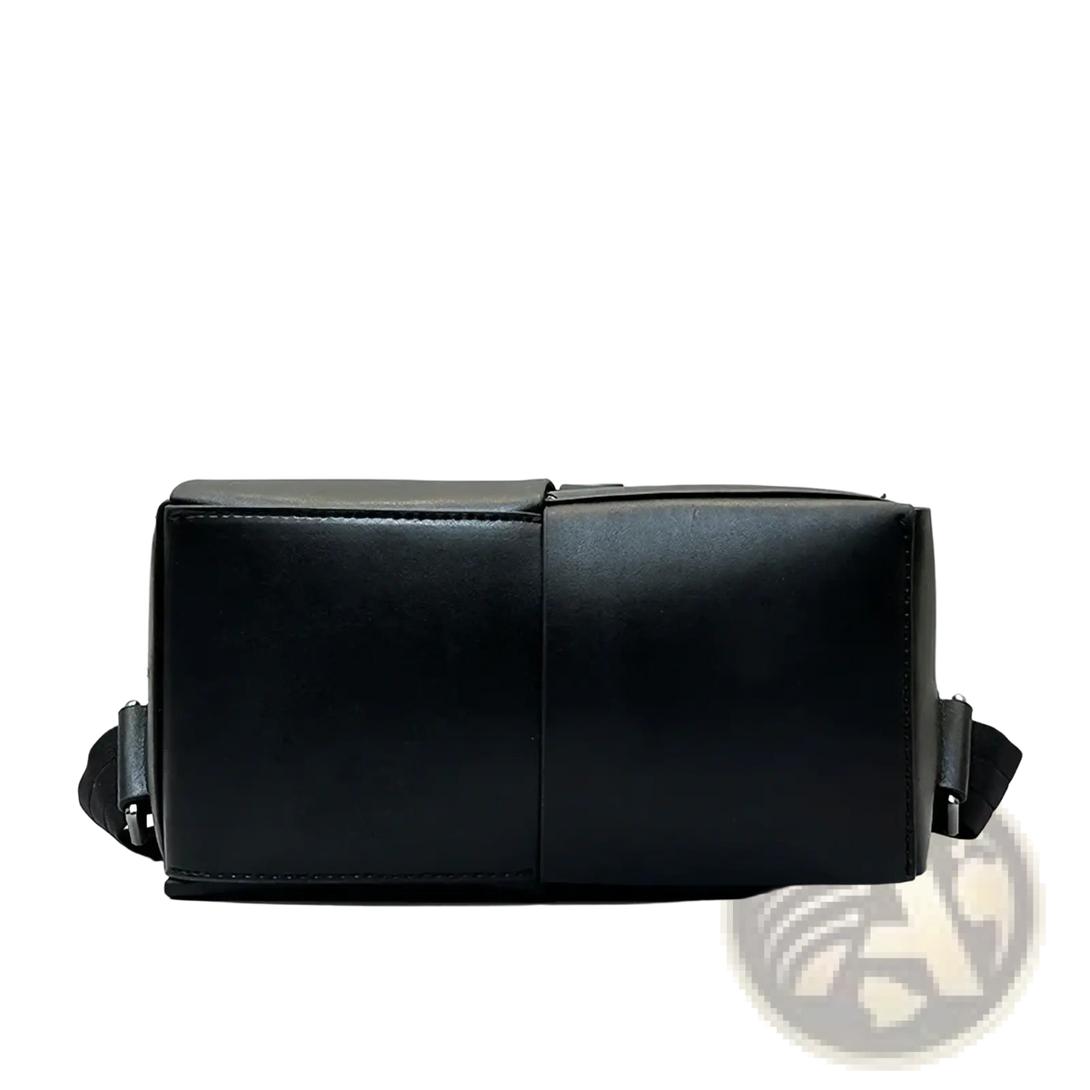 Black leather laptop backpack for men with a sleek minimalist design and structured rectangular crossbody bag shape