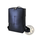 Black leather laptop backpack for men with structured quilted design and silver toned zippers