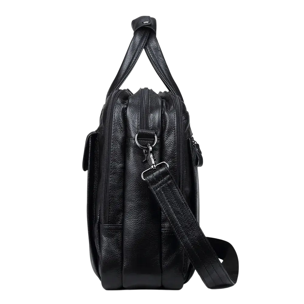 Leather laptop briefcase for men in black leather with textured surface, dual top handles, and adjustable shoulder strap