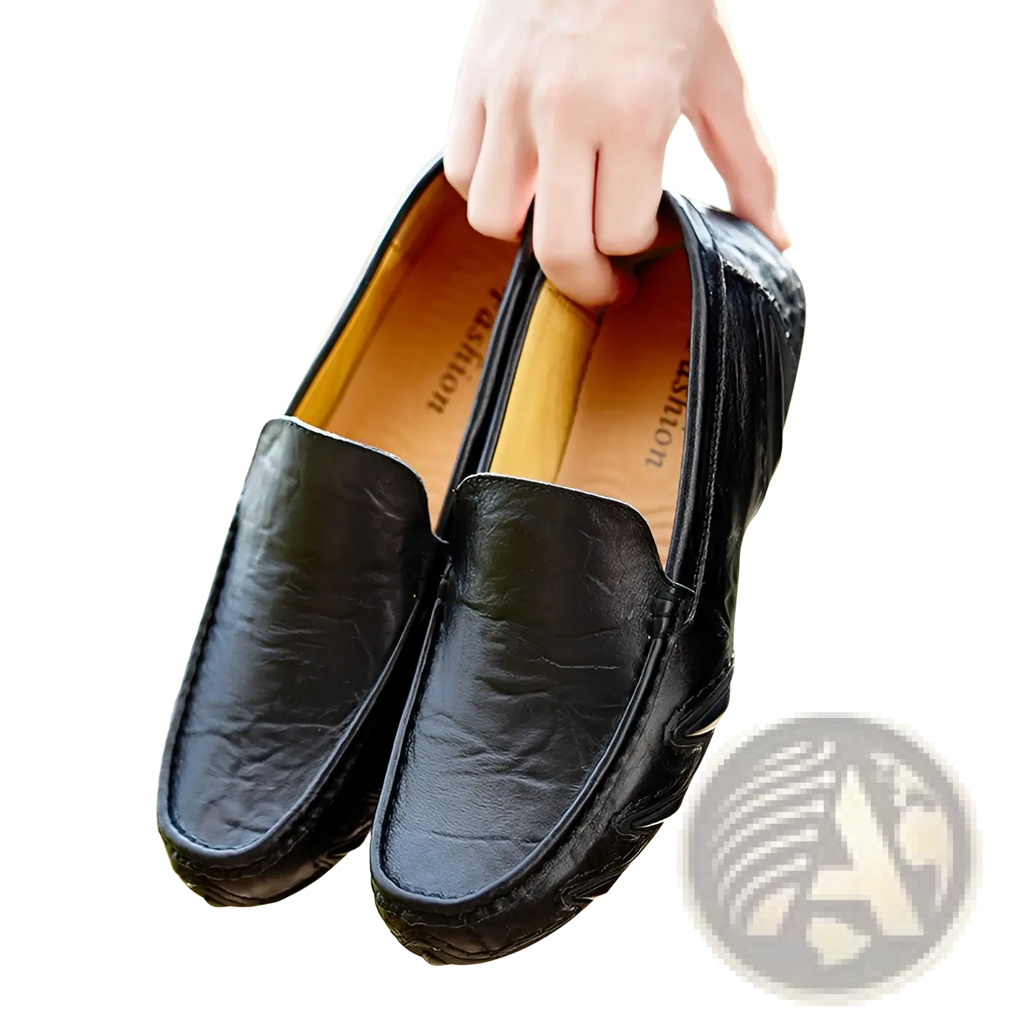 Black leather loafers for men featuring a textured surface and stitched detailing in retro British style shoes