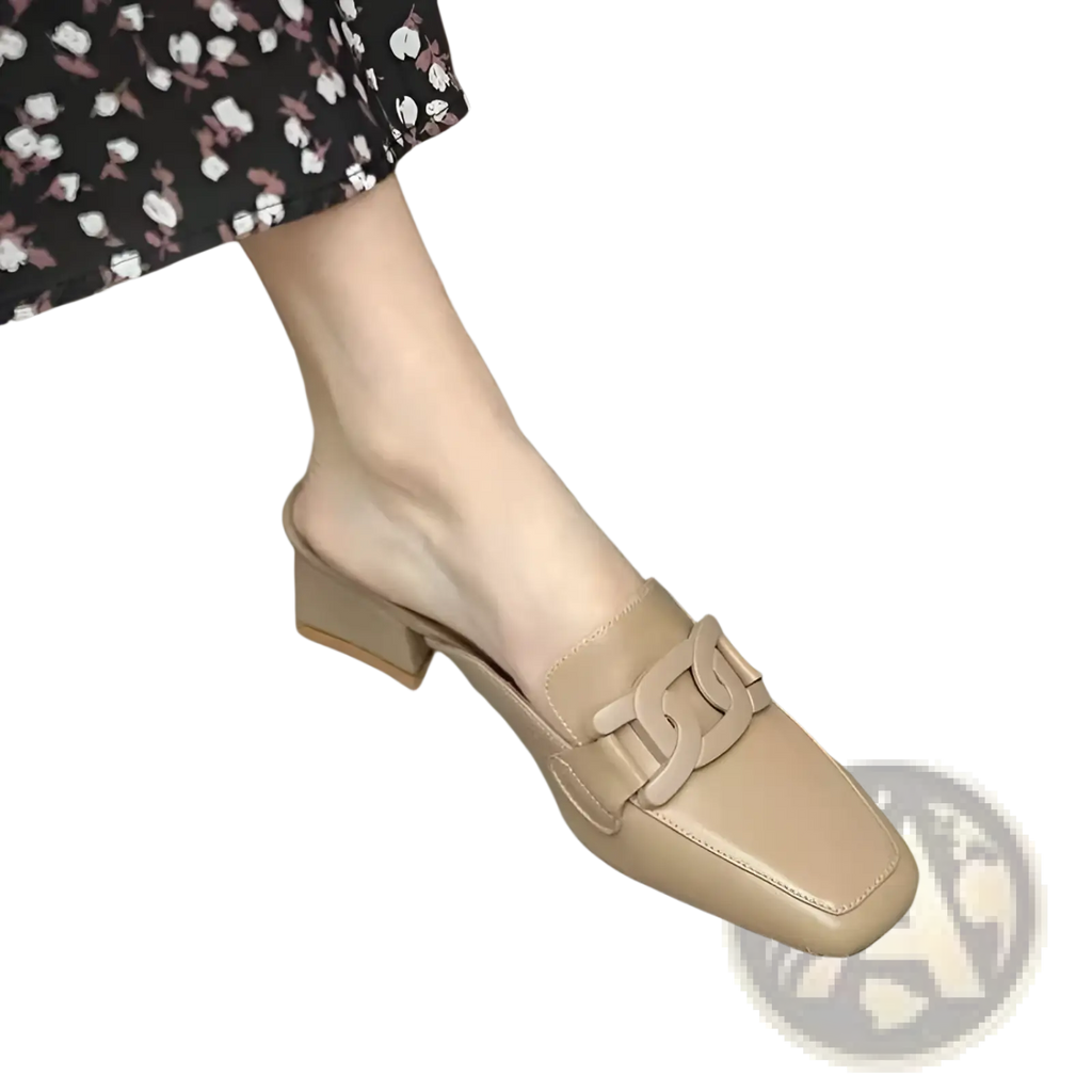 Beige leather loafers with square toe and chain-link strap detail featuring metal buckle square toe pumps