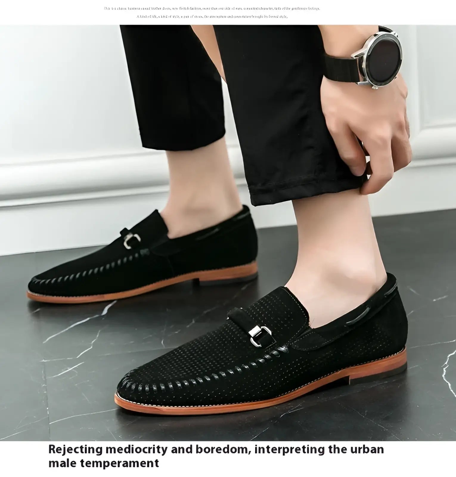 Black suede leather loafers with perforated texture slip on shoes featuring contrasting tan soles and silver buckle detail