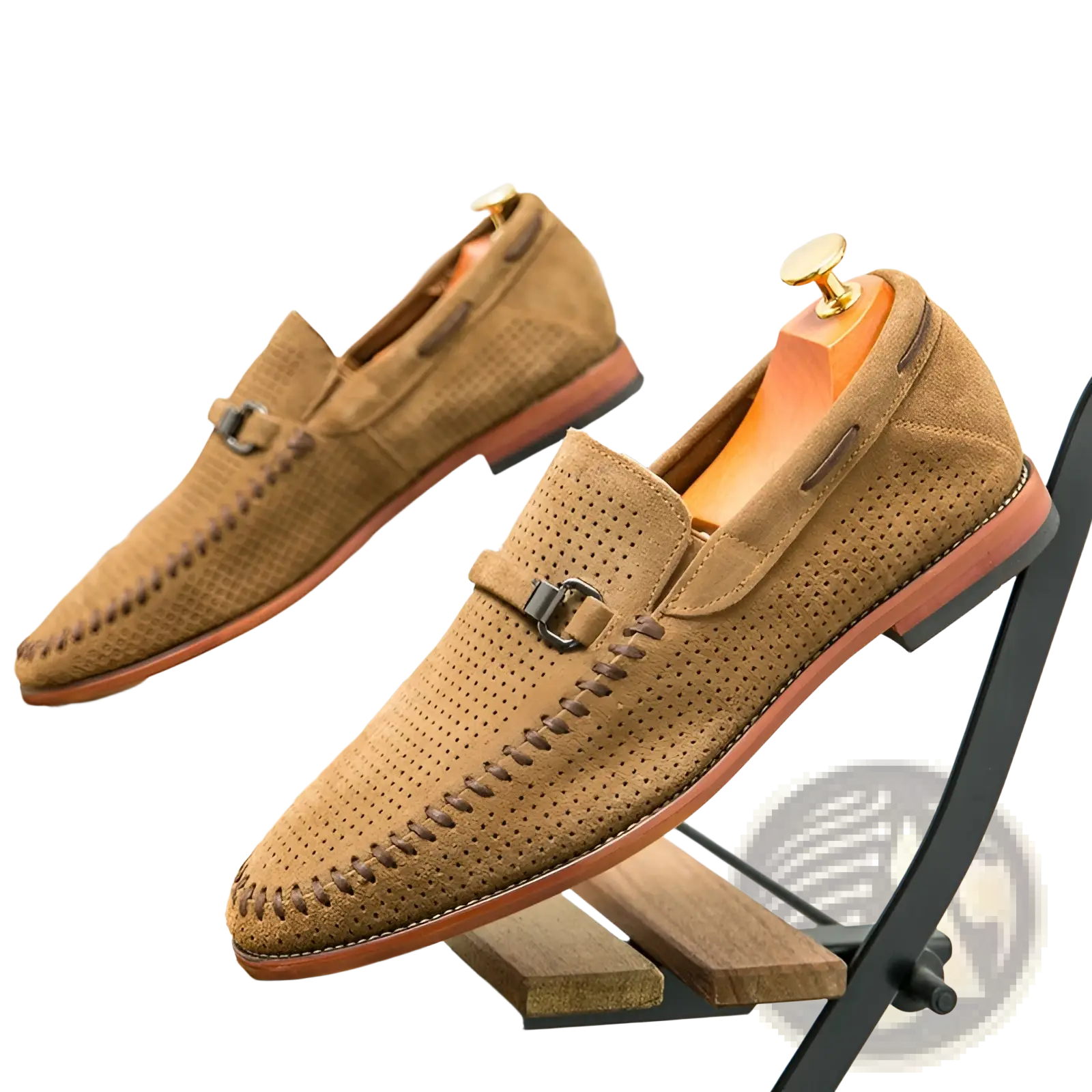Tan leather loafers with perforated suede detailing and a metallic buckle slip on for stylish comfort
