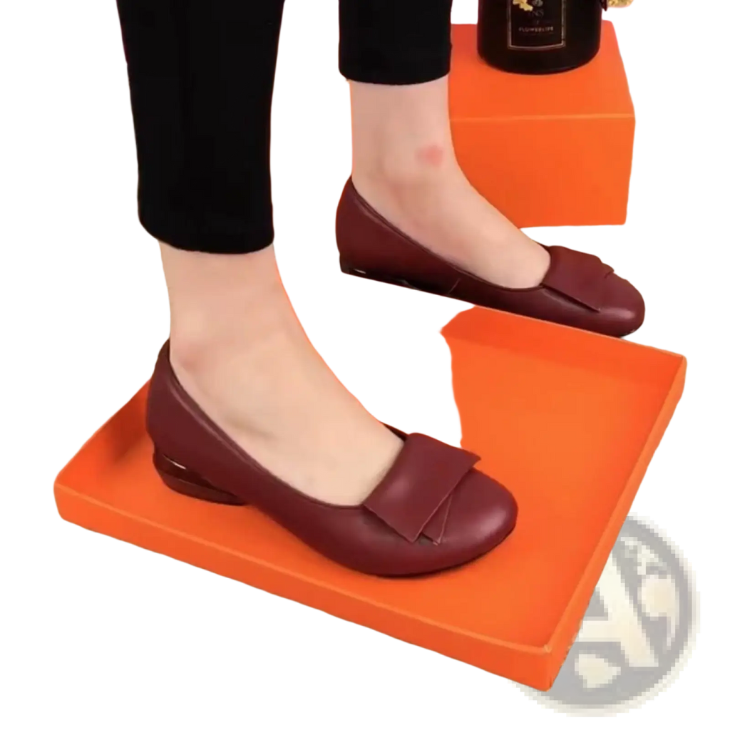 Burgundy leather loafers with square toe and decorative bow detail on the vamp for stylish wear