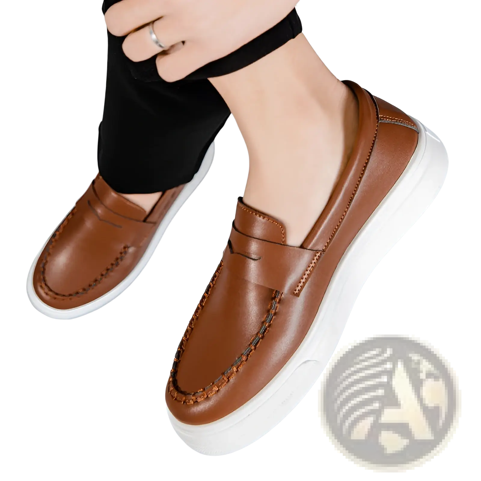 Brown leather slip-on loafers with white rubber soles and decorative stitching for casual wear