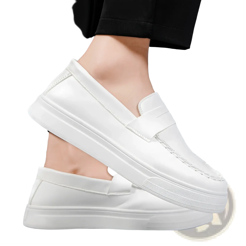 White leather slip-on loafers with thick white rubber platform sole and stitched detailing