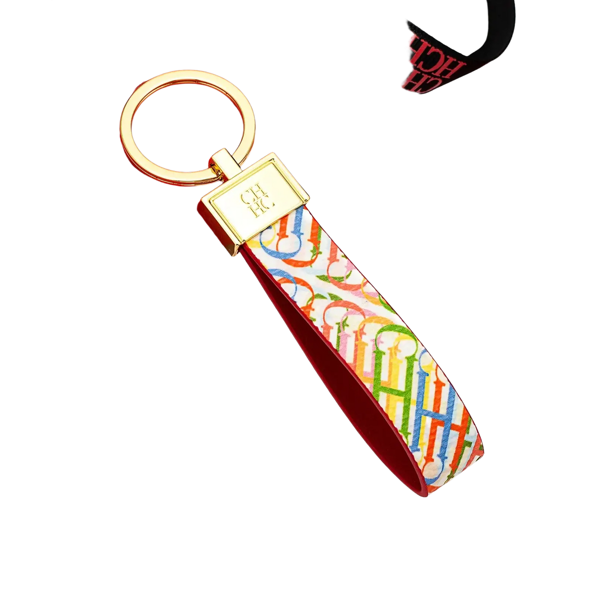 Leather logo keychain with a multicolored h pattern and gold-tone metal ring and plaque designer fashion accessory gift