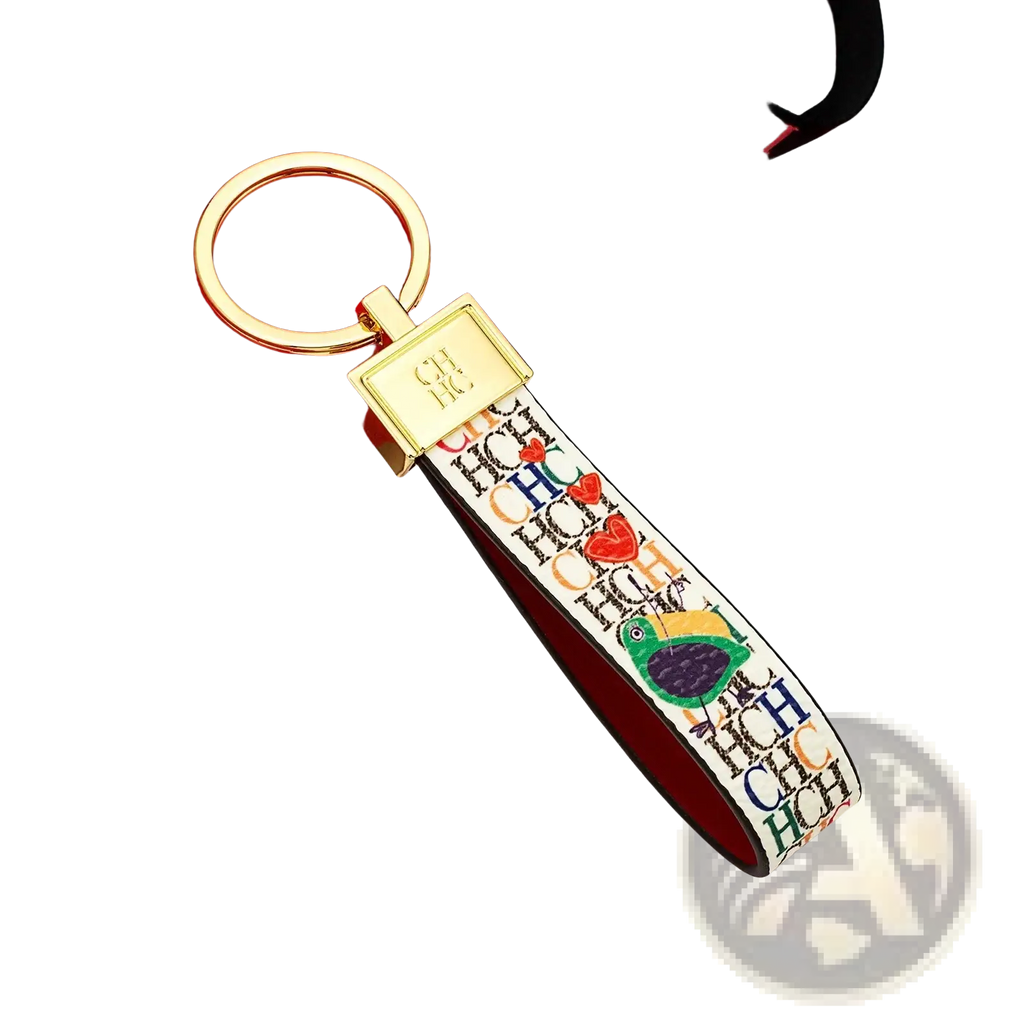 Leather logo keychain with a colorful patterned design, gold-tone metal ring and clasp, featuring hchc logo and hearts