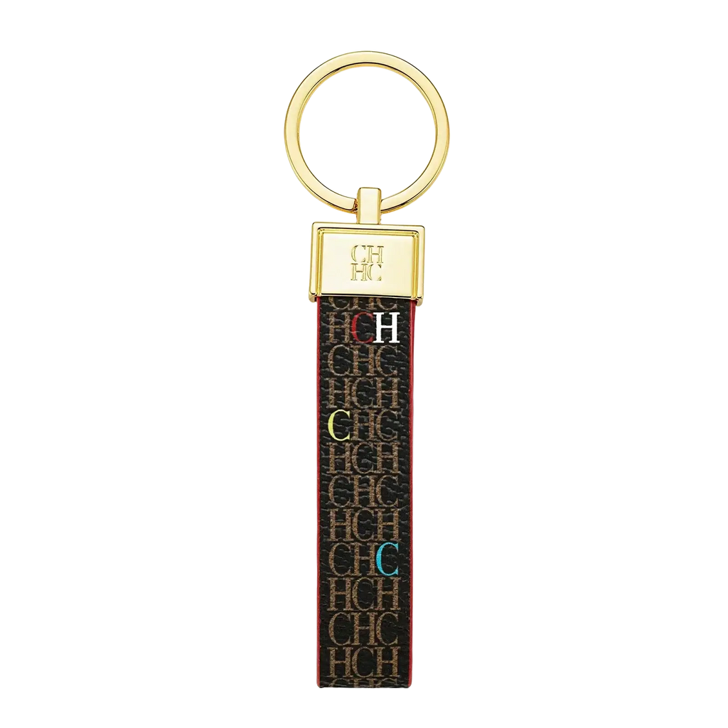 Gold-toned leather logo keychain with black strap featuring beige ch monogram and colorful letters designer fashion accessory gift