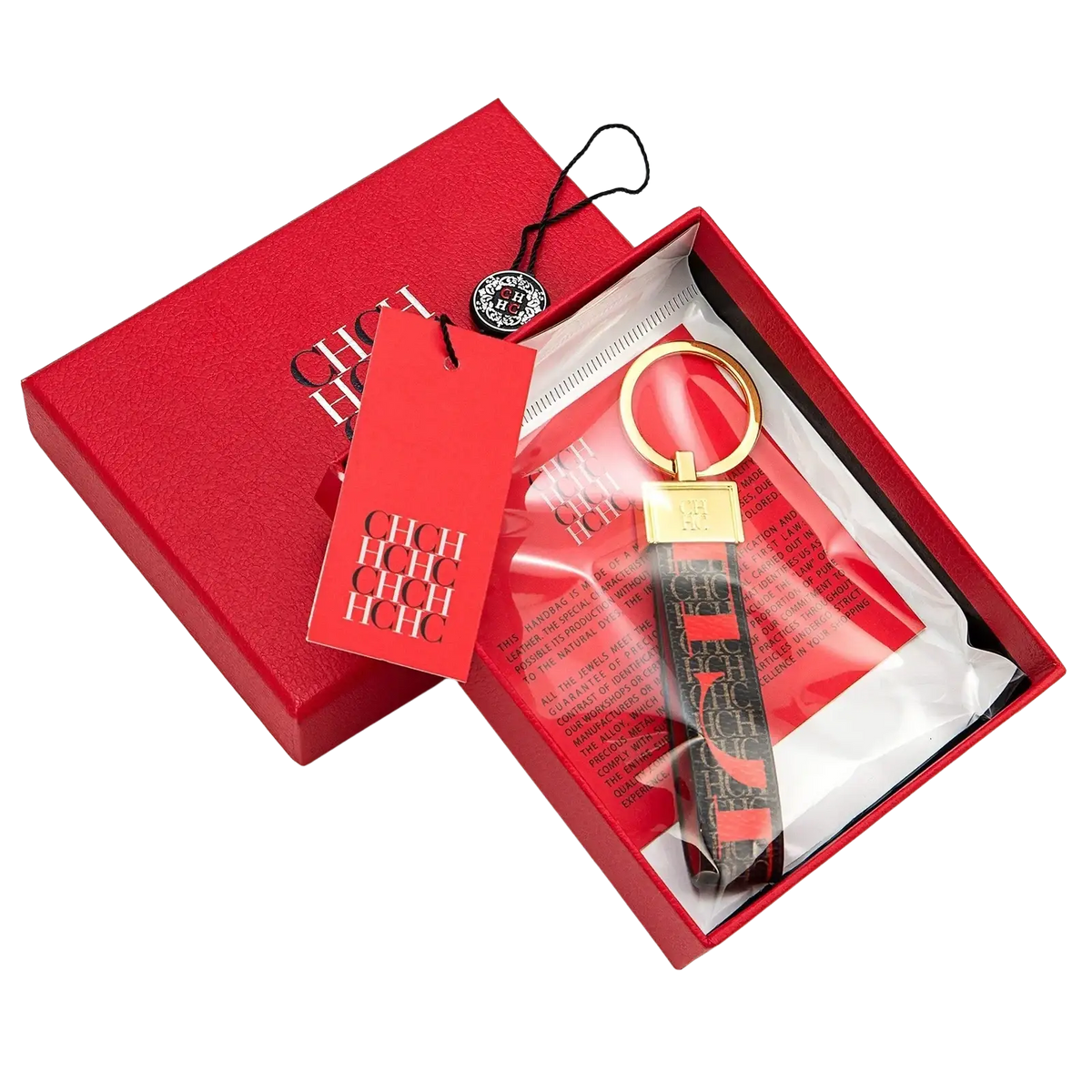 Leather logo keychain gold toned with black strap featuring red chic lettering and hugo boss logo designer accessory gift