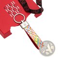 A vibrant rainbow-colored leather logo keychain with a sleek silver metal ring and rectangular plaque accessory gift