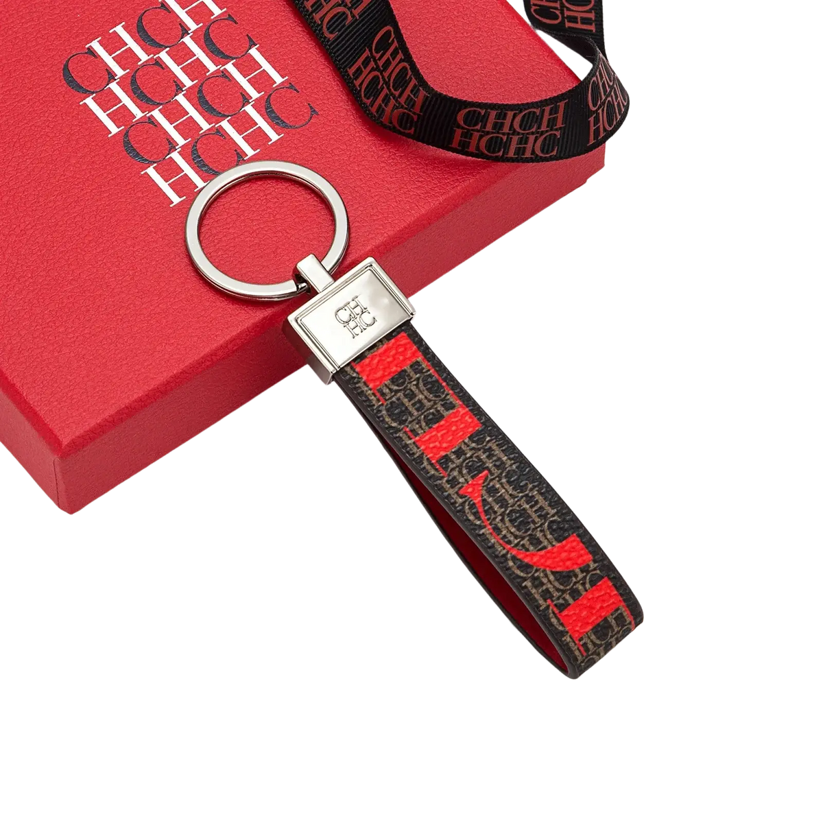 Red and black patterned leather logo keychain with silver metal ring and plaque designer fashion accessory gift