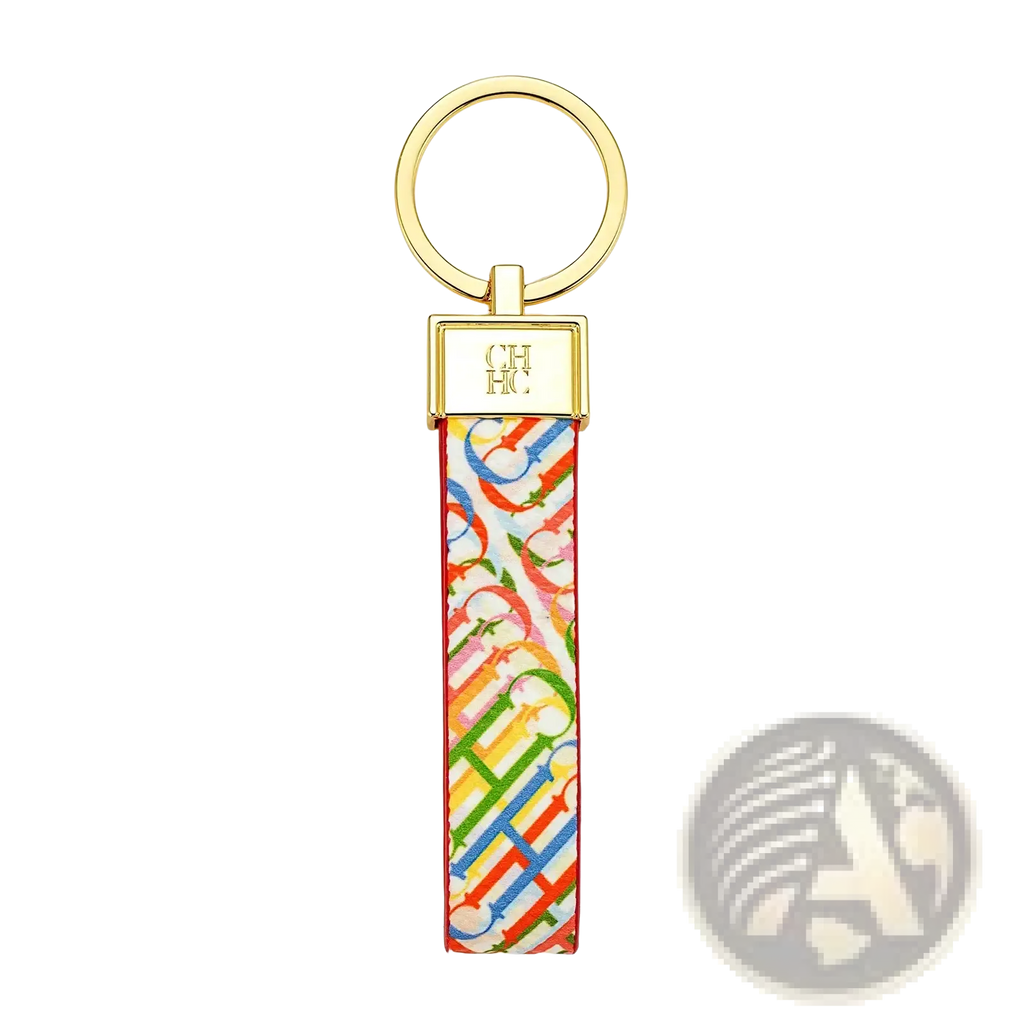 A vibrant multicolored leather logo keychain with ch pattern fabric strap and gold-tone metal hardware designer accessory