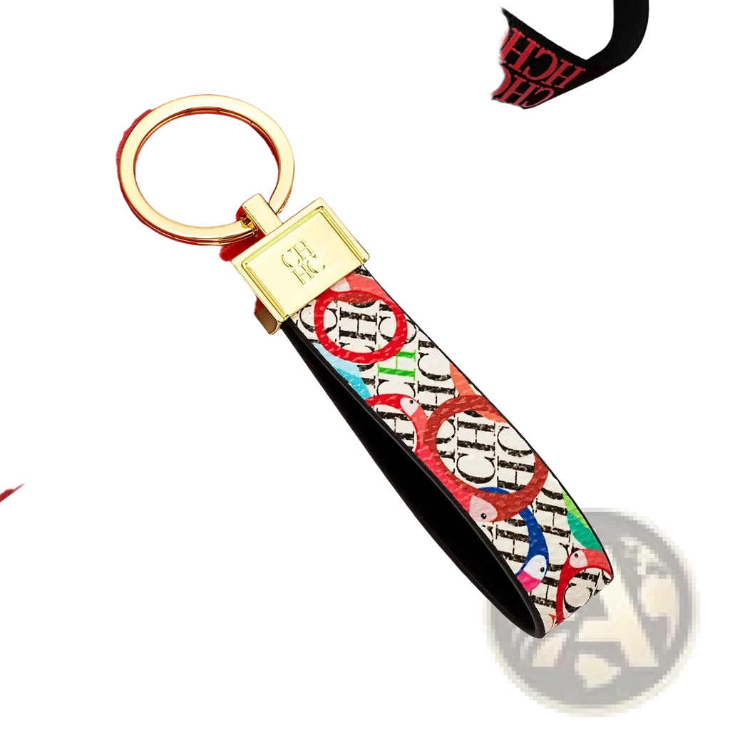 A vibrant multicolored leather logo keychain with repeating chc pattern white background and black edges accessory gift