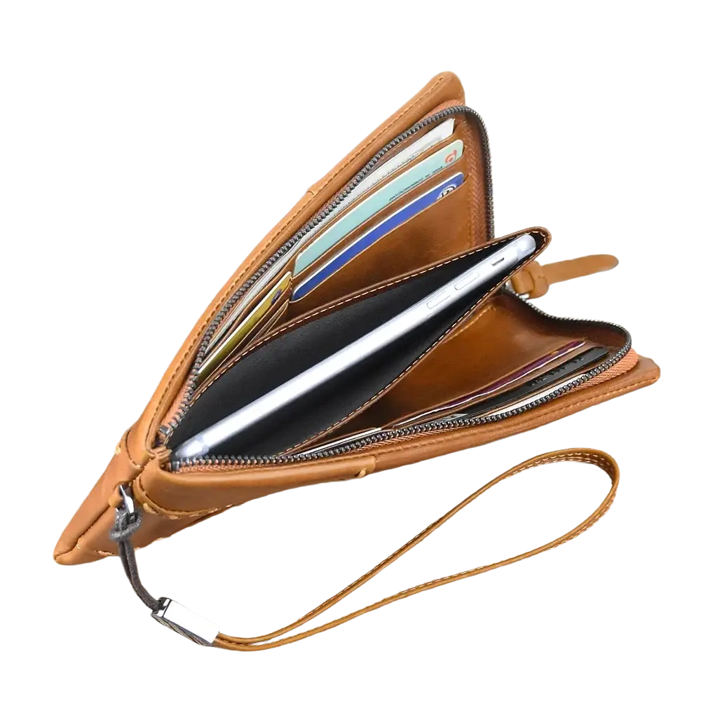 Tan leather long wallet cowhide zip clutch phone purse with multiple card slots and wrist strap holding a smartphone
