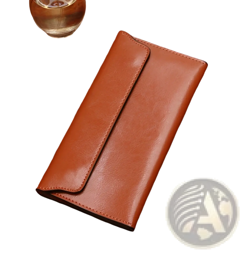 A tan leather long wallet slim minimalist cowhide clutch with smooth textured surface and visible edge stitching