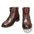 Brown leather martin boots with red interior panel and brass eyelets featuring lace-up design