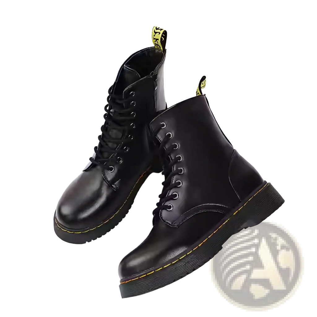 Black leather martin boots with round toe, flat ankle design, yellow stitching, lace-up closure, and pull tabs