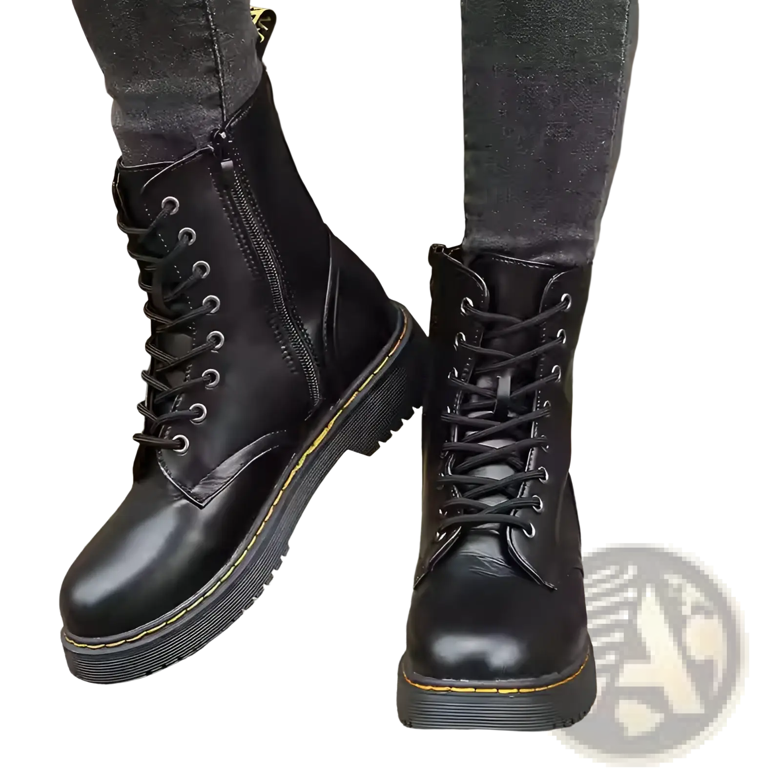 Black leather dr martin boots with round toe and flat ankle design for casual and formal wear