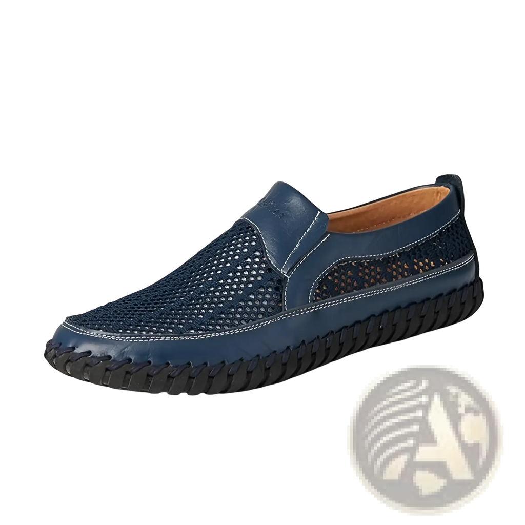 Navy blue perforated leather slip-on loafer with braided rubber sole for comfortable casual wear