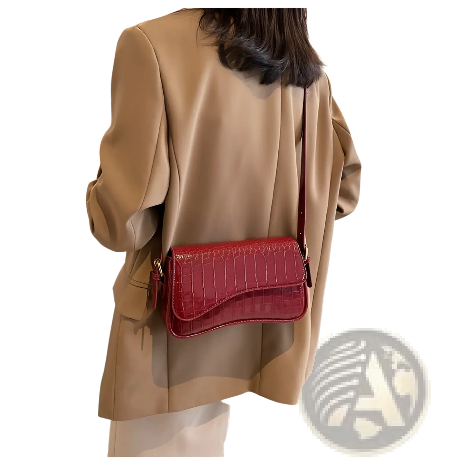 A glossy red leather messenger bag with crocodile texture and a sleek modern design minimalist crossbody organ bag