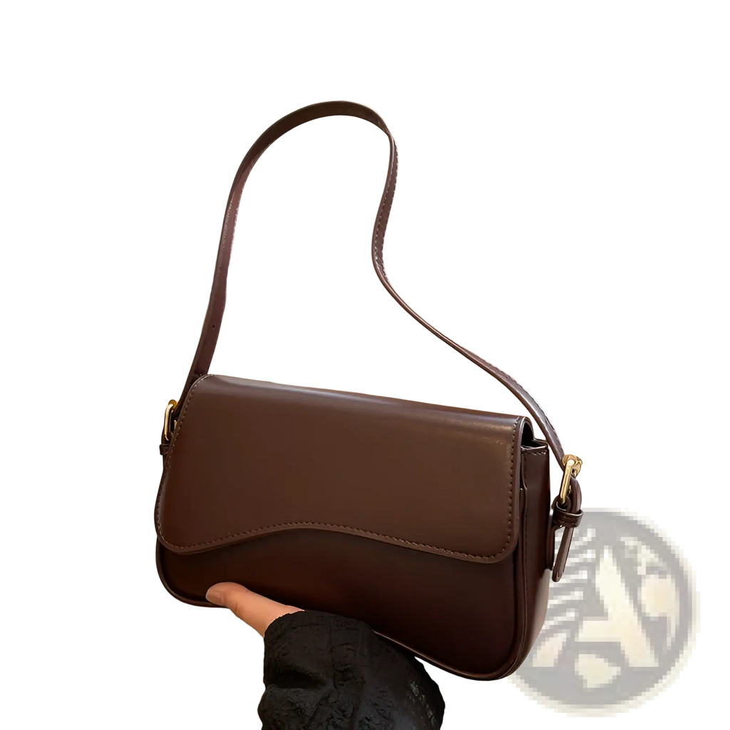 Brown leather minimalist crossbody messenger bag with gold-tone hardware for organized daily use