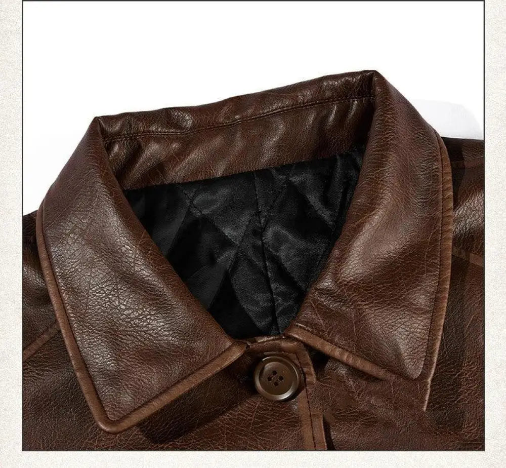 Brown faux leather unisex mid length trench coat collar with black quilted lining and matching brown button detail