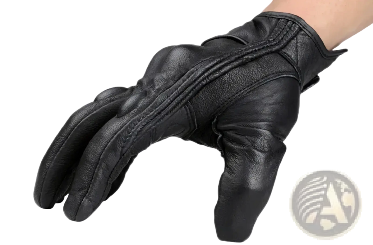 Black leather motorcycle glove with carbon knuckle protection and reinforced padding shown from the back side
