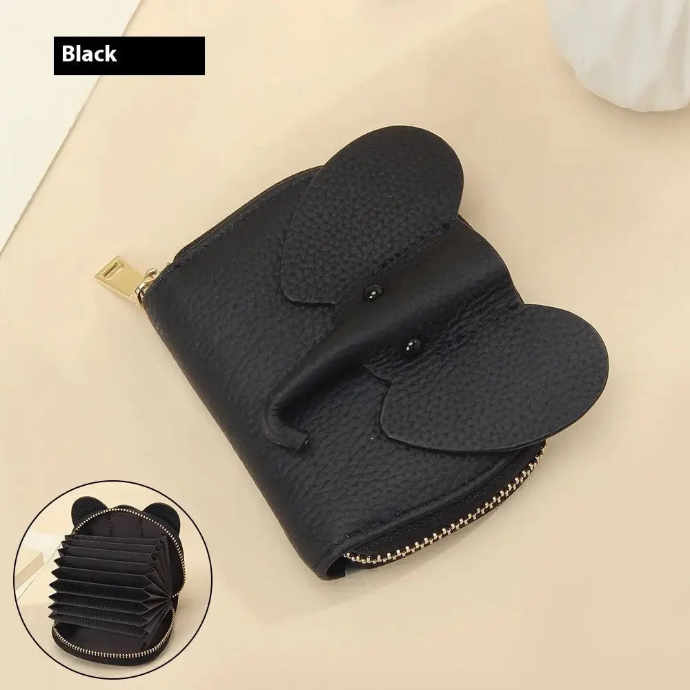 Black elephant leather accordion card holder wallet featuring textured leather and gold tone zipper accents