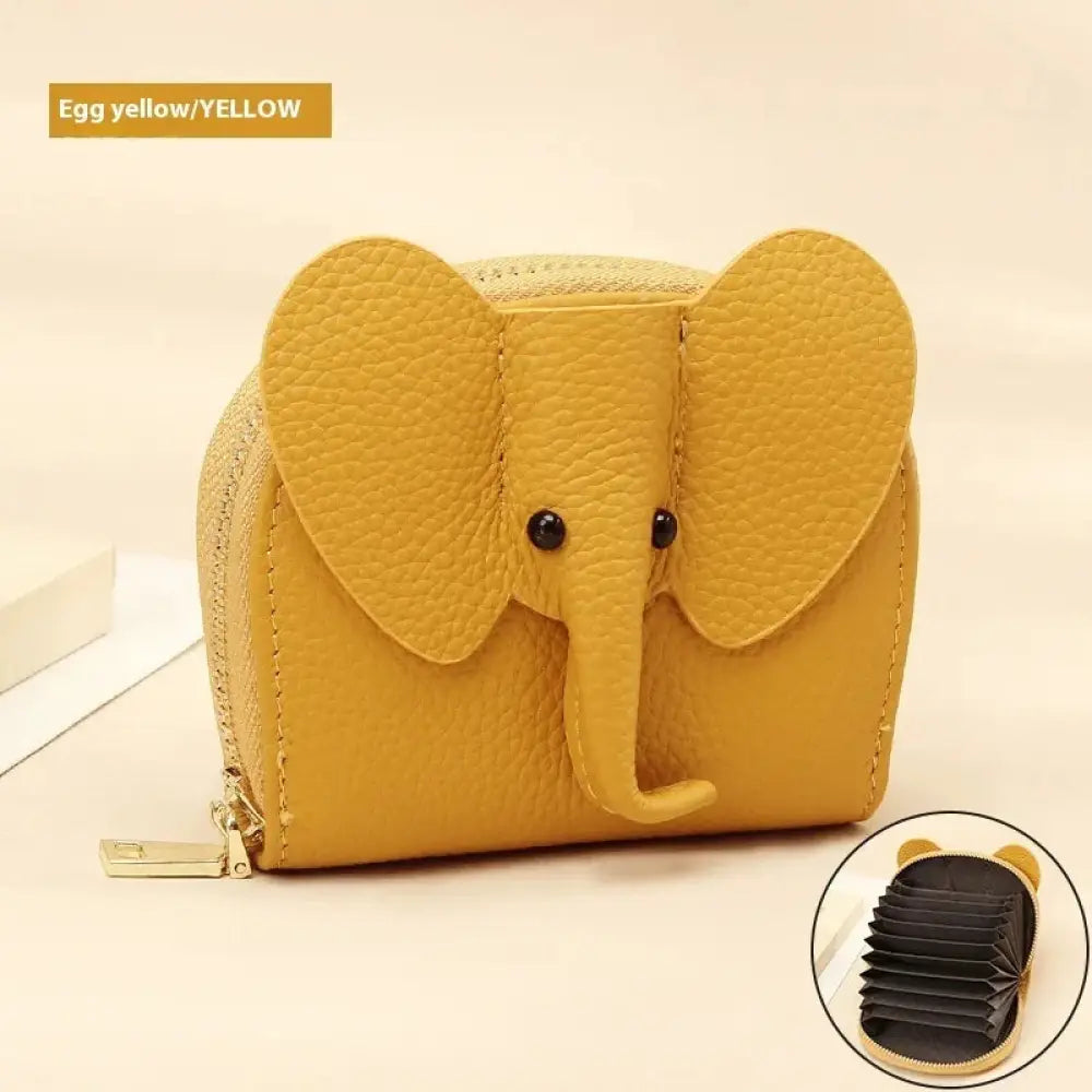 Egg yellow elephant leather accordion card holder wallet with textured finish and black button eyes