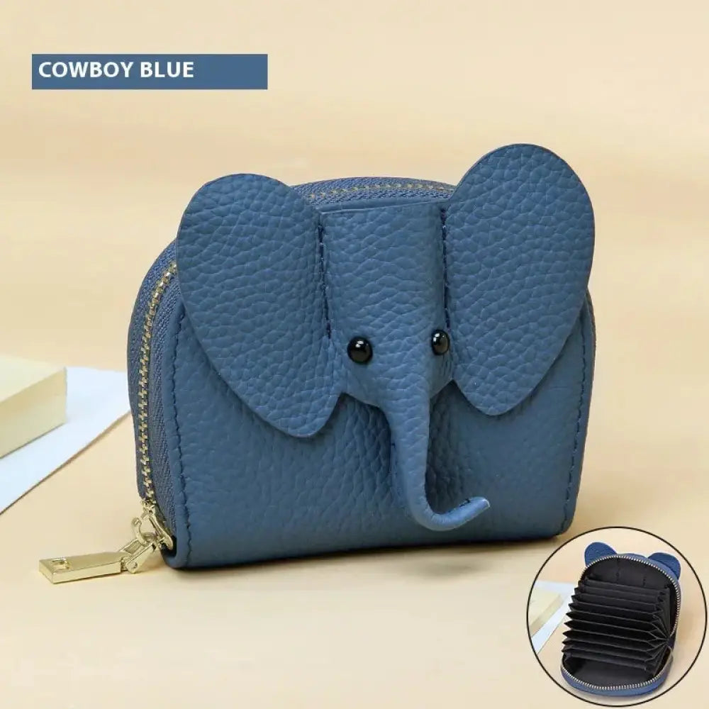 Blue elephant leather accordion card holder wallet with textured material and black bead eyes
