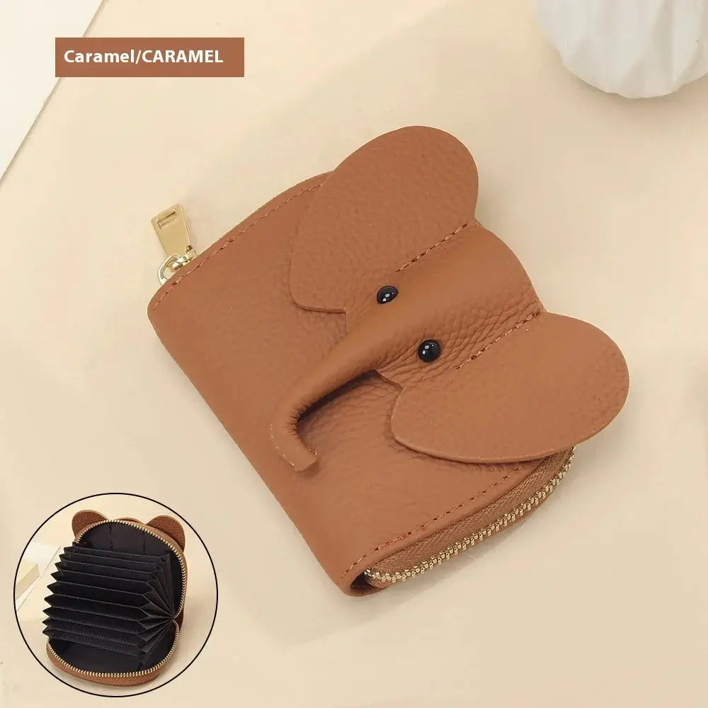 Caramel-colored elephant leather accordion card holder wallet with black bead eyes and gold zipper closure