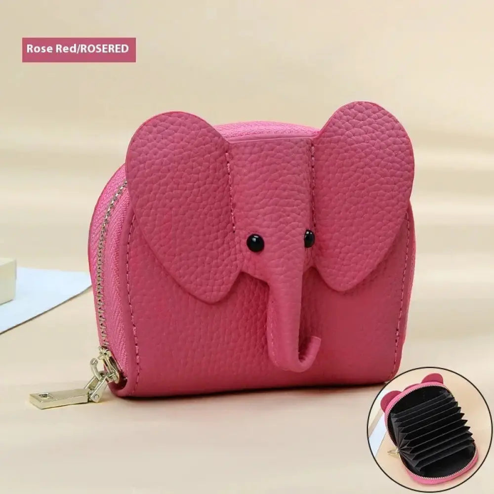 Pink elephant-shaped accordion card holder wallet made of textured faux leather with black button eyes