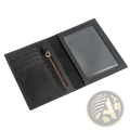 Black textured leather passport holder with red stitching and zippered compartment for secure travel storage