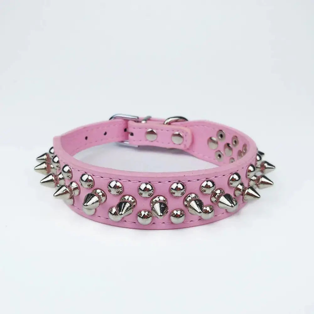 Pink leather dog collar with silver-toned spikes and studs for small and medium breeds