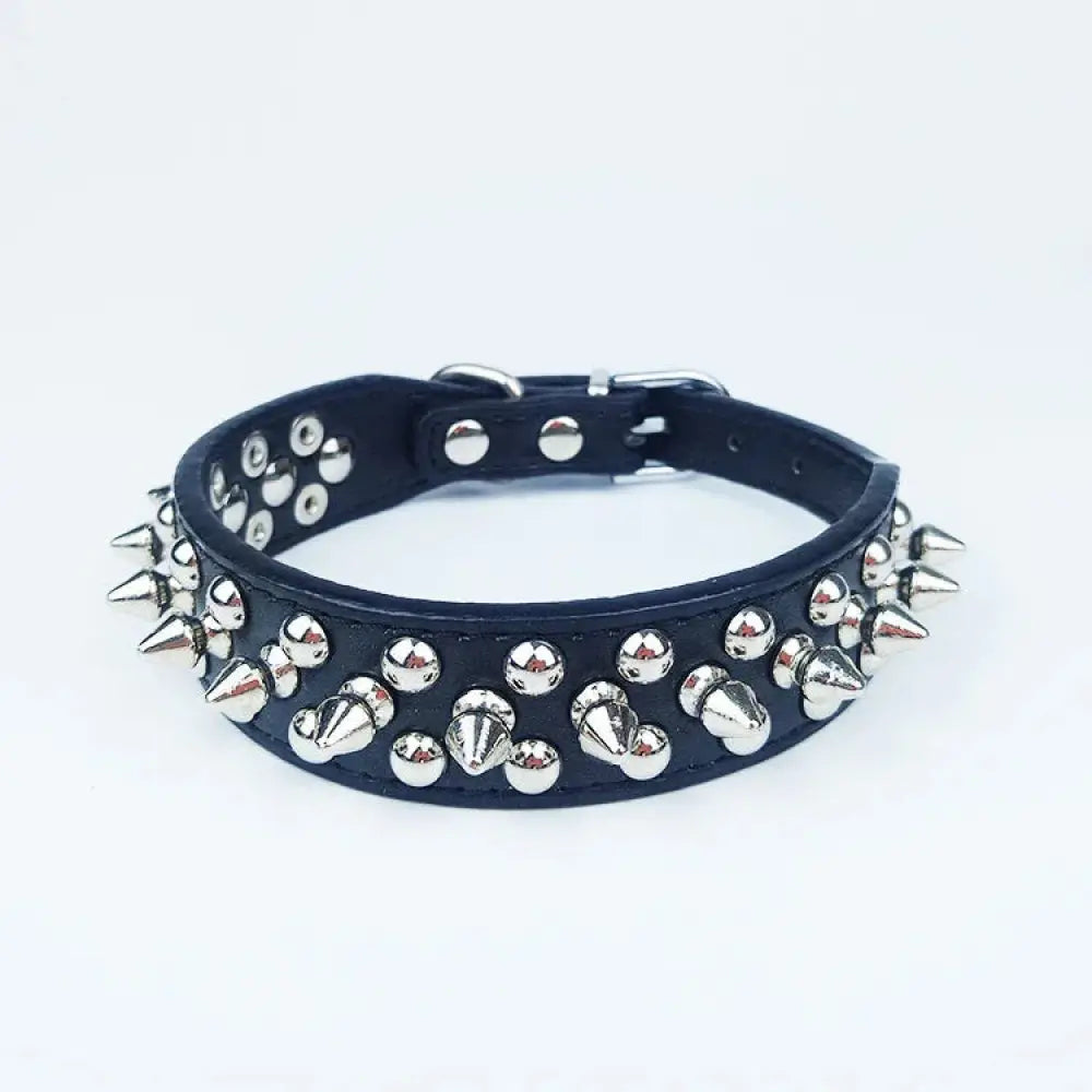 Black leather dog collar for small and medium breeds adorned with silver-toned spikes and studs