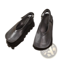 Black leather platform sandals with chunky sole open toe design and adjustable strap for a retro look