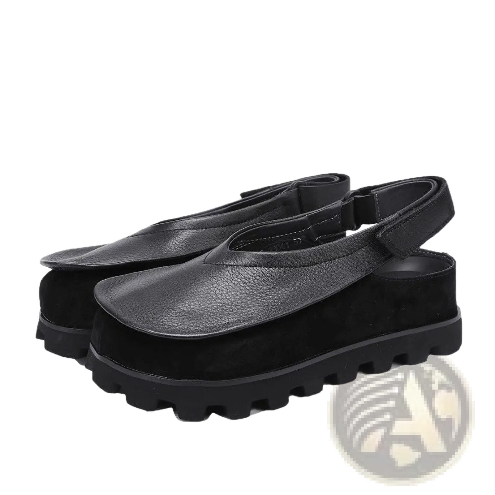 Black leather and suede chunky platform sandals with a strap across the foot and an open toe design